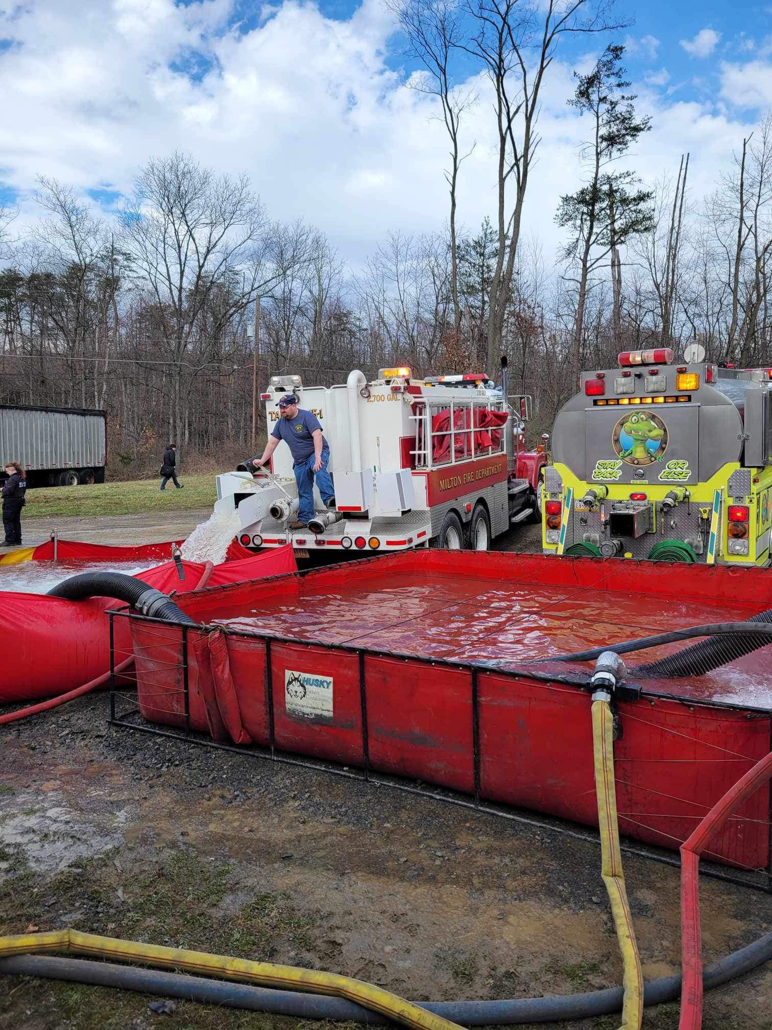 Tanker 64 providing water as a fill site.